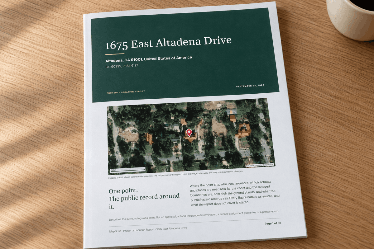 A property report cover with a small company name in the header and a map pin